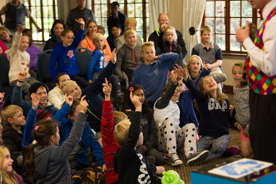 audience-volunteering-at-tricky-trevor-birthday-party-magic-show